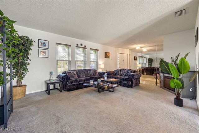 132 SW 34th Ln, Cape Coral, FL 33914 - carpeted living area with a textured ceiling