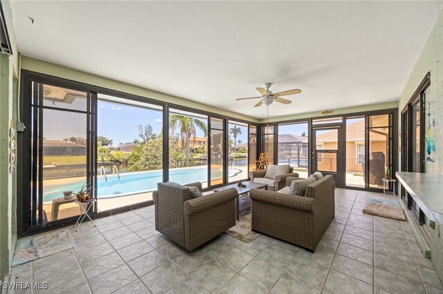 132 SW 34th Ln, Cape Coral, FL 33914 - sunroom with ceiling fan, an outdoor living space, and healthy amount of natural light