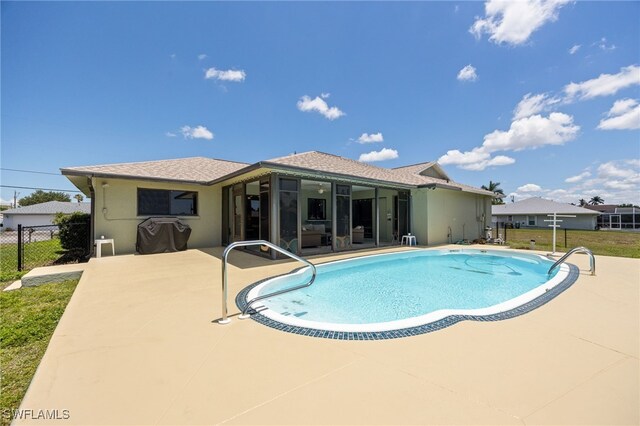132 SW 34th Ln, Cape Coral, FL 33914 - view of swimming pool with fence and a patio area