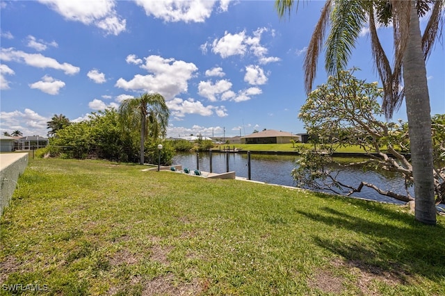 132 SW 34th Ln, Cape Coral, FL 33914 - view of grassy yard with a water view