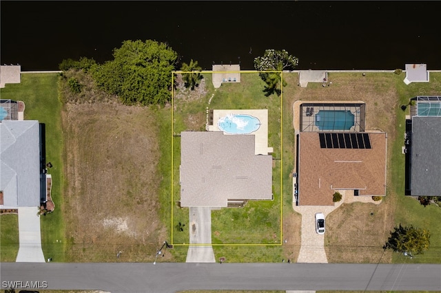 132 SW 34th Ln, Cape Coral, FL 33914 - aerial view of property's location featuring property boundaries highlighted and a pool area