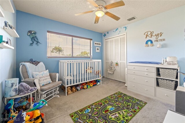 132 SW 34th Ln, Cape Coral, FL 33914 - carpeted bedroom with a closet, a textured ceiling, and ceiling fan
