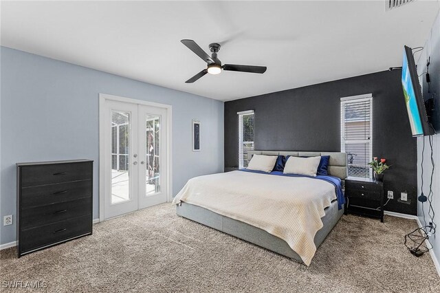 1233 NW 26th Pl, Cape Coral, FL 33993 - bedroom with french doors, access to outside, and multiple windows