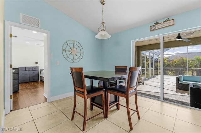 1233 NW 26th Pl, Cape Coral, FL 33993 - dining room featuring ceiling fan, baseboards, and light tile patterned floors