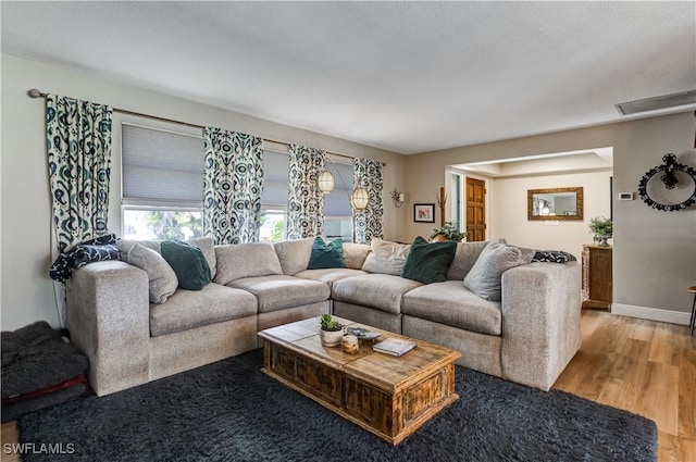 5692 Eichen Cir W, Fort Myers, FL 33919 - living room with wood finished floors and baseboards
