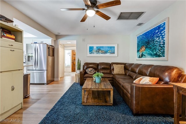 5692 Eichen Cir W, Fort Myers, FL 33919 - living area with ceiling fan, light wood-type flooring, and baseboards