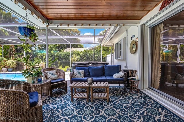 5692 Eichen Cir W, Fort Myers, FL 33919 - sunroom featuring an outdoor hangout area