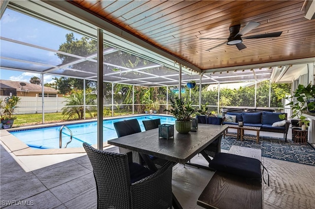 5692 Eichen Cir W, Fort Myers, FL 33919 - view of swimming pool with an outdoor hangout area, a patio area, ceiling fan, and a lanai