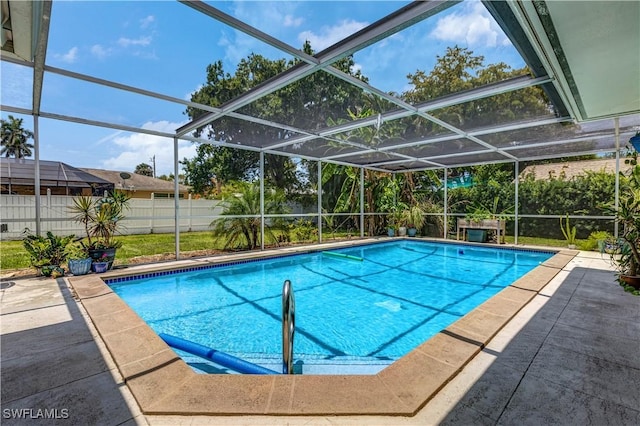 5692 Eichen Cir W, Fort Myers, FL 33919 - view of pool with a fenced backyard, a patio, and glass enclosure