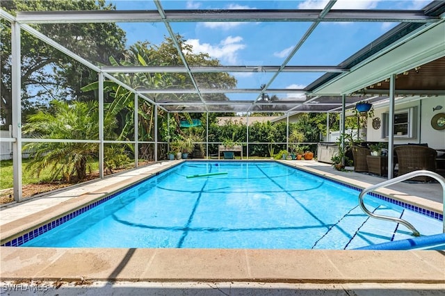 5692 Eichen Cir W, Fort Myers, FL 33919 - outdoor pool featuring glass enclosure and a patio area