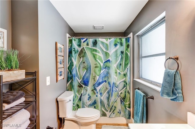 5692 Eichen Cir W, Fort Myers, FL 33919 - bathroom with toilet and curtained shower