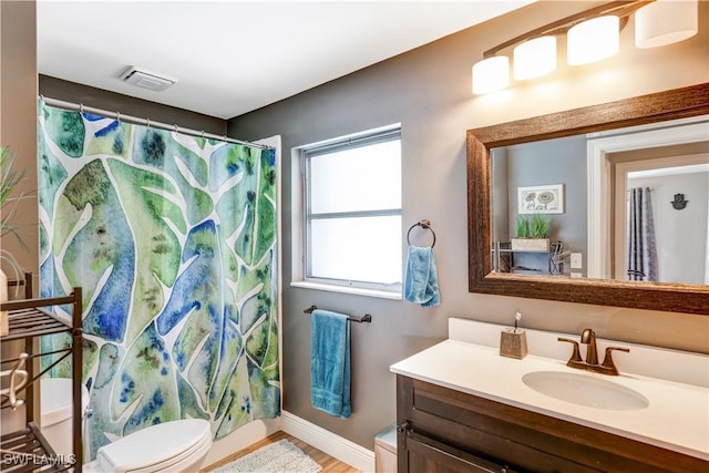 5692 Eichen Cir W, Fort Myers, FL 33919 - full bath featuring vanity, toilet, baseboards, and a shower with shower curtain