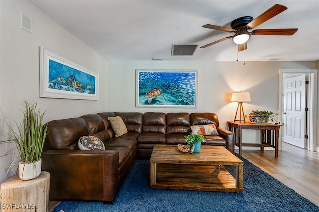 5692 Eichen Cir W, Fort Myers, FL 33919 - living room with a ceiling fan and wood finished floors