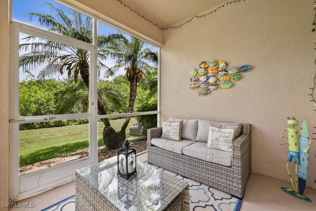 13180 SW Pembroke Cir, Lake Suzy, FL 34269 - sunroom with an outdoor hangout area