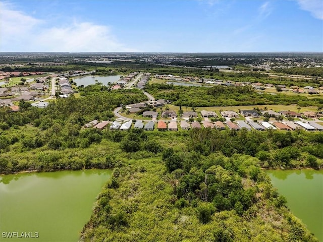 13180 SW Pembroke Cir, Lake Suzy, FL 34269 - aerial perspective of suburban area with a large body of water