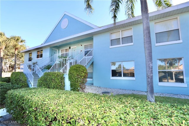 161 Wading Bird Cir Unit L202, Naples, FL 34110 - view of property with stairway
