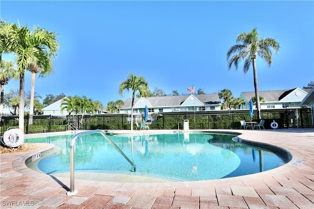 161 Wading Bird Cir Unit L202, Naples, FL 34110 - community pool with fence and a patio