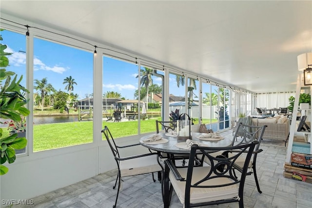 6212 Cocos Dr, Fort Myers, FL 33908 - sunroom / solarium featuring a water view