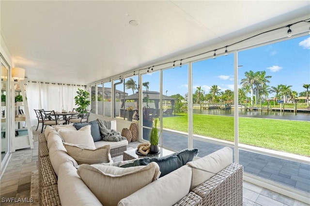 6212 Cocos Dr, Fort Myers, FL 33908 - sunroom featuring an outdoor hangout area and a water view
