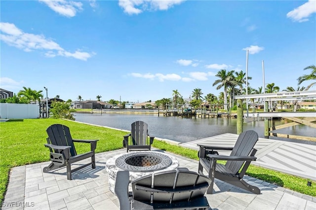 6212 Cocos Dr, Fort Myers, FL 33908 - view of patio with an outdoor fire pit and a water view