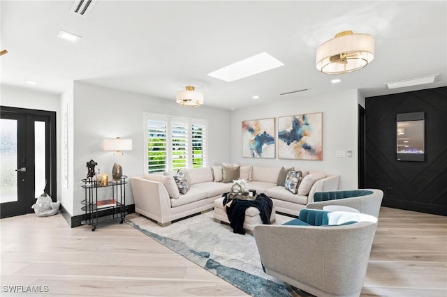 6212 Cocos Dr, Fort Myers, FL 33908 - living area featuring a skylight, light wood-type flooring, and recessed lighting