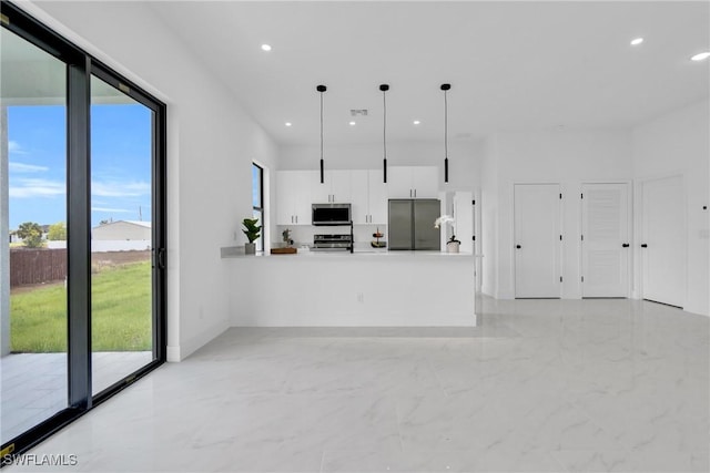 2003 Curry Ave N, Lehigh Acres, FL 33971 - unfurnished living room with light marble finish floors and recessed lighting