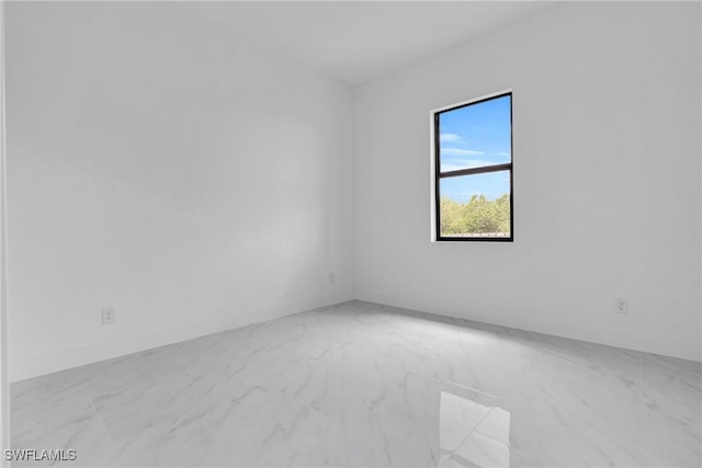 2003 Curry Ave N, Lehigh Acres, FL 33971 - empty room with marble look tiles