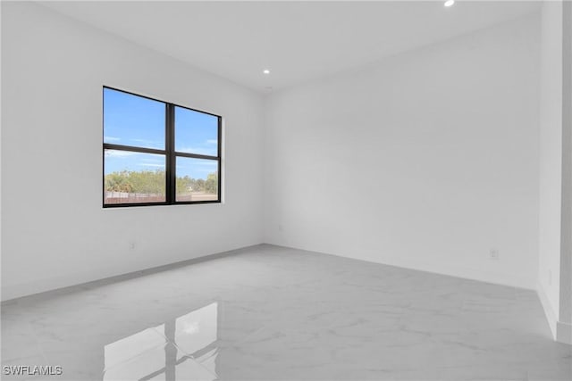 2003 Curry Ave N, Lehigh Acres, FL 33971 - spare room with recessed lighting and baseboards