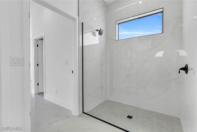 2003 Curry Ave N, Lehigh Acres, FL 33971 - full bath featuring marble tiled flooring, a marble finish shower, and baseboards