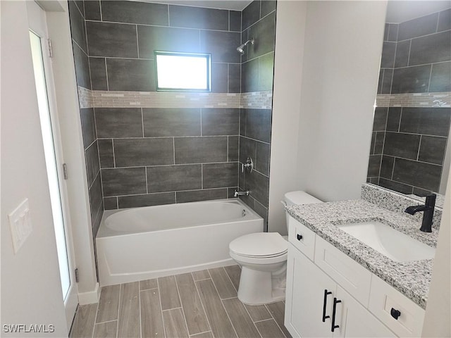 27584 Playa Del Rey Ln, Bonita Springs, FL 34135 - bathroom with vanity, bathing tub / shower combination, and wood finish floors