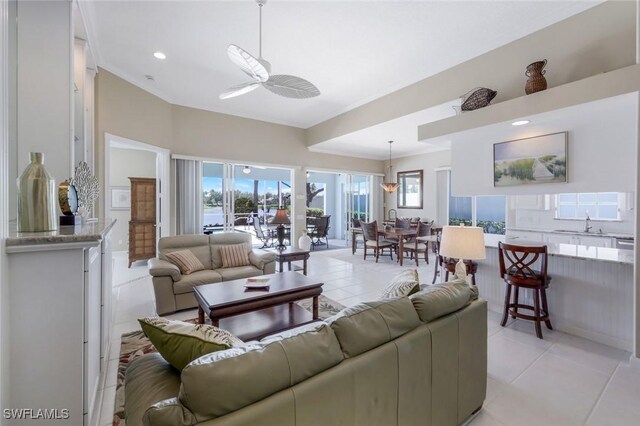 3774 Whidbey Way, Naples, FL 34119 - living area with light tile patterned floors, ceiling fan, and recessed lighting
