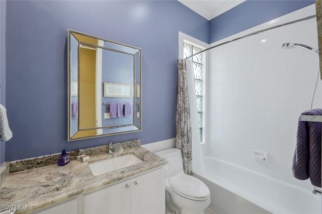 3774 Whidbey Way, Naples, FL 34119 - full bath featuring toilet, vanity, shower / bath combo with shower curtain, and ornamental molding