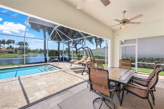 3774 Whidbey Way, Naples, FL 34119 - view of patio featuring a ceiling fan, a water view, an outdoor pool, and glass enclosure