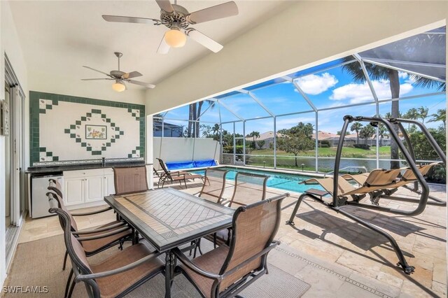 3774 Whidbey Way, Naples, FL 34119 - view of patio / terrace featuring a ceiling fan, outdoor dining area, an outdoor pool, and a lanai