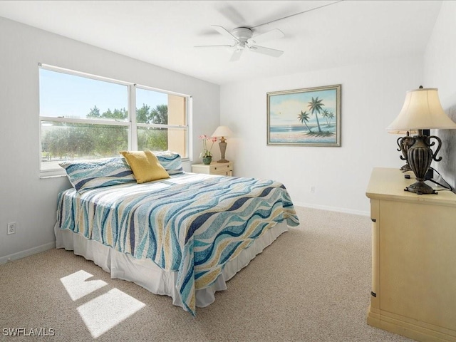 901 Collier Ct Unit 5-205, Marco Island, FL 34145 - bedroom featuring carpet floors, baseboards, and ceiling fan