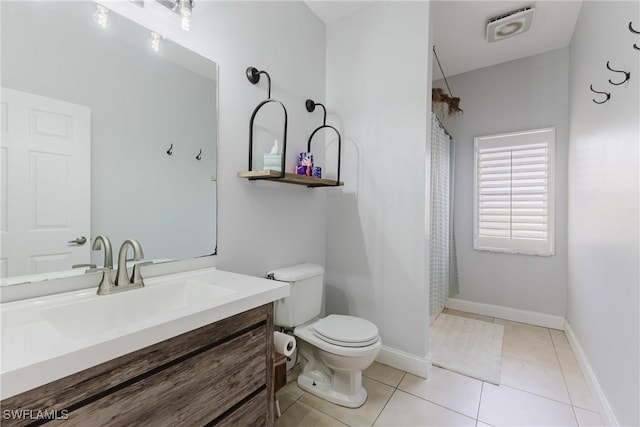 5208 Bygone St, Lehigh Acres, FL 33971 - full bathroom featuring toilet, curtained shower, vanity, and tile patterned floors