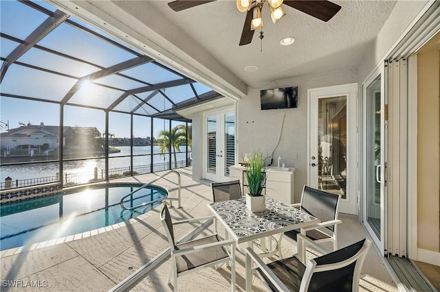 4013 Bastia Ct, Punta Gorda, FL 33950 - swimming pool featuring french doors, a patio, ceiling fan, and glass enclosure