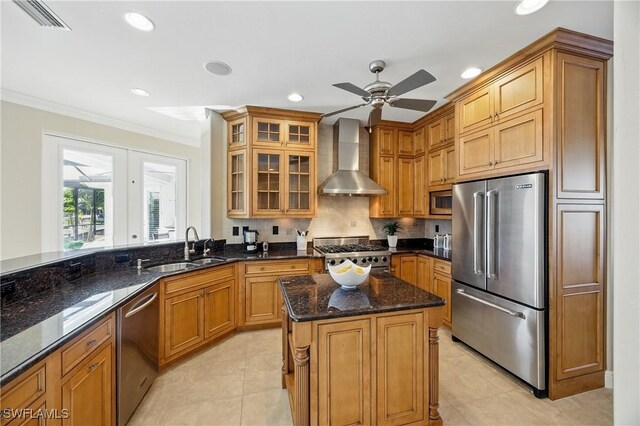 4013 Bastia Ct, Punta Gorda, FL 33950 - kitchen featuring appliances with stainless steel finishes, wall chimney range hood, a sink, ceiling fan, and crown molding