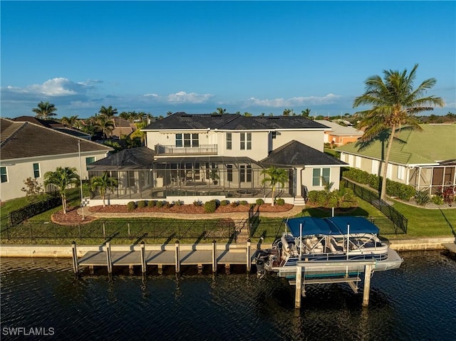 4013 Bastia Ct, Punta Gorda, FL 33950 - back of property featuring a balcony, boat lift, a water view, and stucco siding