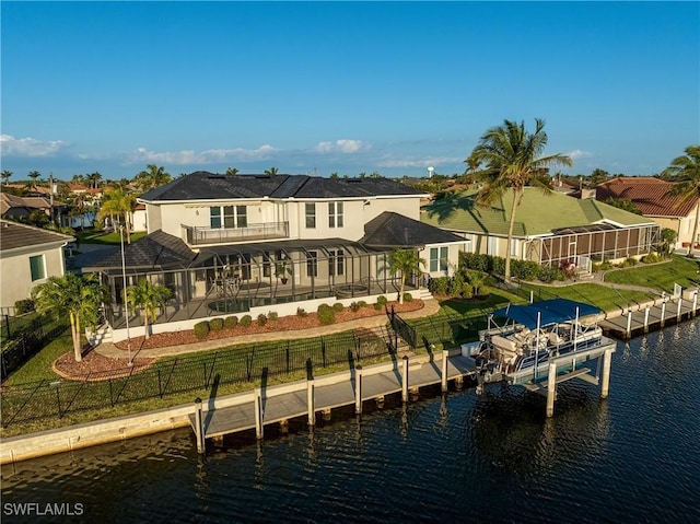 4013 Bastia Ct, Punta Gorda, FL 33950 - back of property featuring a patio, a water view, a balcony, and boat lift