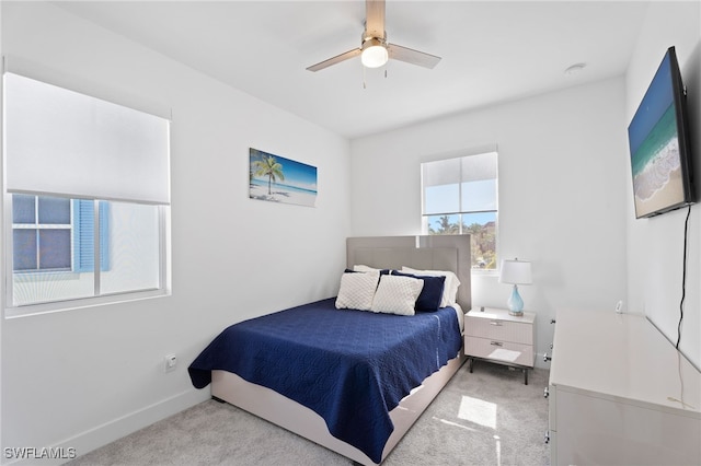 5851 Shell Cove Dr Unit 101A, Cape Coral, FL 33914 - carpeted bedroom with baseboards and a ceiling fan