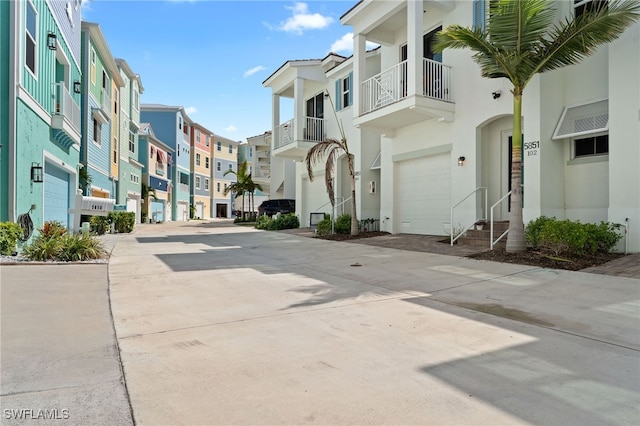 5851 Shell Cove Dr Unit 101A, Cape Coral, FL 33914 - view of concrete road featuring a residential view