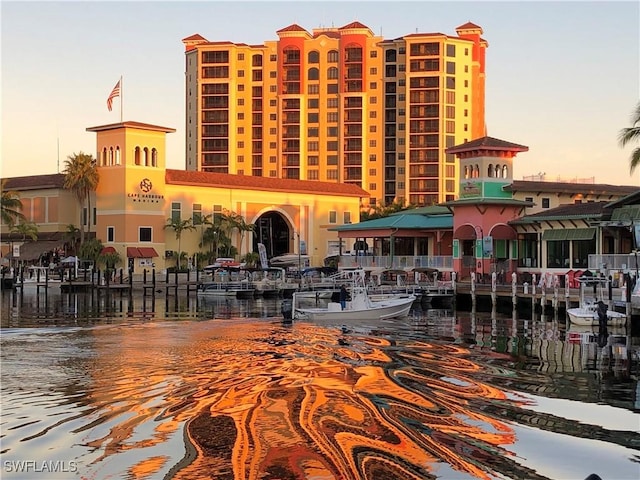 5851 Shell Cove Dr Unit 101A, Cape Coral, FL 33914 - property at dusk featuring a water view