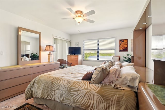 16000 Bay Pointe Blvd Unit 307, North Fort Myers, FL 33917 - bedroom featuring a ceiling fan and light tile patterned floors