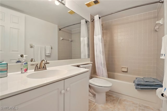 16000 Bay Pointe Blvd Unit 307, North Fort Myers, FL 33917 - bathroom with tile patterned floors, shower / bath combo, toilet, and vanity