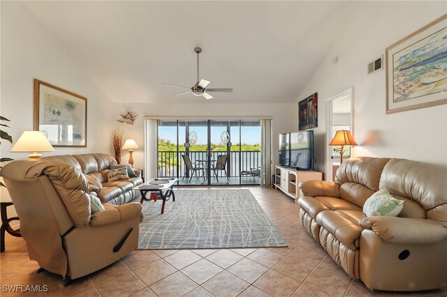 16000 Bay Pointe Blvd Unit 307, North Fort Myers, FL 33917 - living room with ceiling fan, light tile patterned floors, and high vaulted ceiling