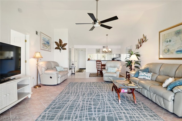 16000 Bay Pointe Blvd Unit 307, North Fort Myers, FL 33917 - tiled living room with ceiling fan, high vaulted ceiling, and a chandelier