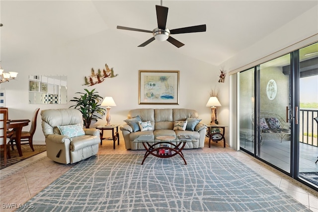 16000 Bay Pointe Blvd Unit 307, North Fort Myers, FL 33917 - living room with tile patterned floors, vaulted ceiling, a ceiling fan, and a chandelier