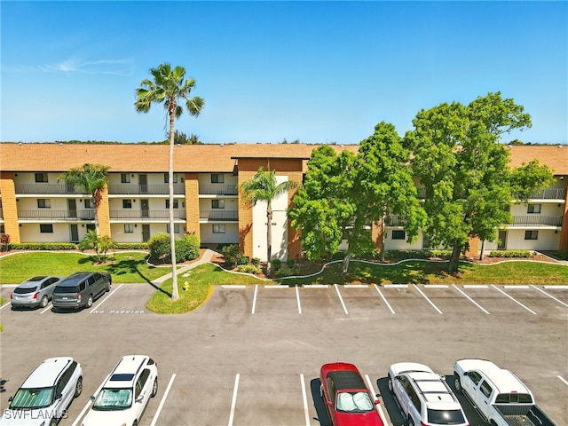 16000 Bay Pointe Blvd Unit 307, North Fort Myers, FL 33917 - view of property featuring uncovered parking