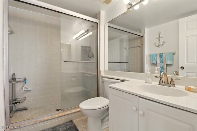 16000 Bay Pointe Blvd Unit 307, North Fort Myers, FL 33917 - bathroom featuring a shower stall, toilet, and vanity